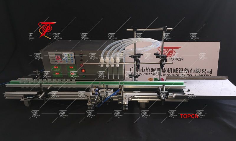 Four nozzzles automatic table top liquid filling machine 30ml small bottle